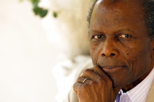 cara de sidney poitier con un traje de color gris 915a03c8 focus 0 0 895 573