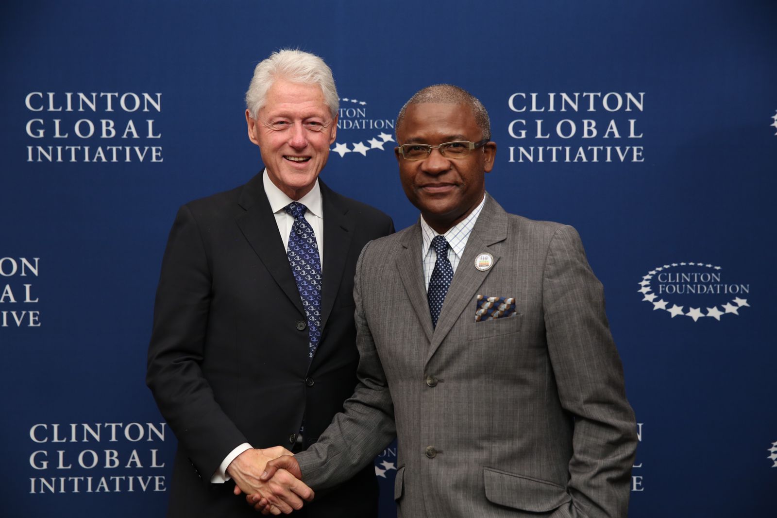 Foto Ulrick Gaillard fundador de BRA y el ex presidente Bill Clinton.