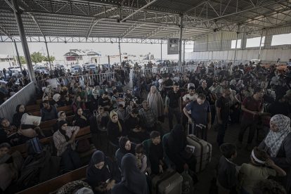 Rafah border crossing between Gaza and Egypt opens to allow limited evacuations