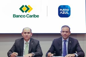 Edgar Del Toro, presidente de Banco Caribe y Eugene Rault Grulloěn Vicepresidente Ejecutivo de Servicios Digitales Popular